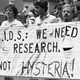 A group advocating AIDS research marches down Fifth Avenue during the 14th annual Lesbian and Gay Pride parade in New York, June 27, 1983. Photo via AP Images.